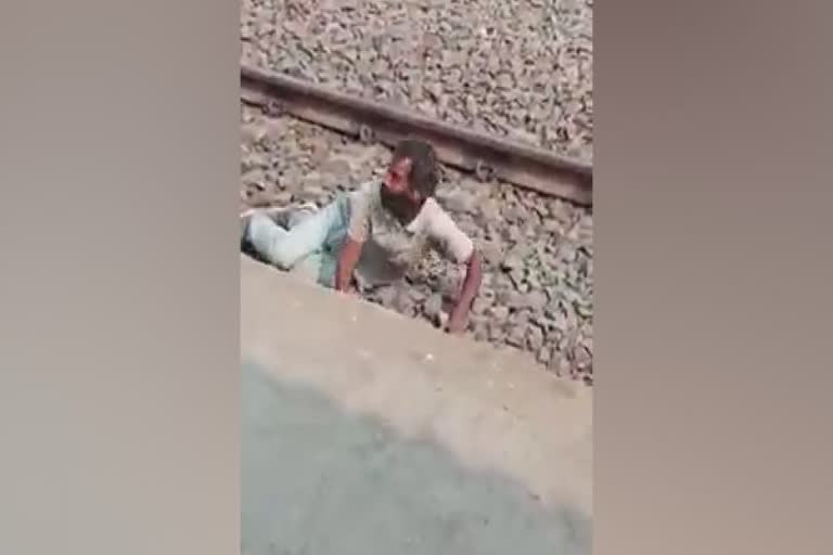 Viral Video Of Train Passing Over Youth In Patna