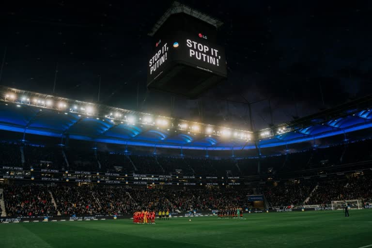 German club Eintracht Frankfurt lights up its stadium in Ukraine colours