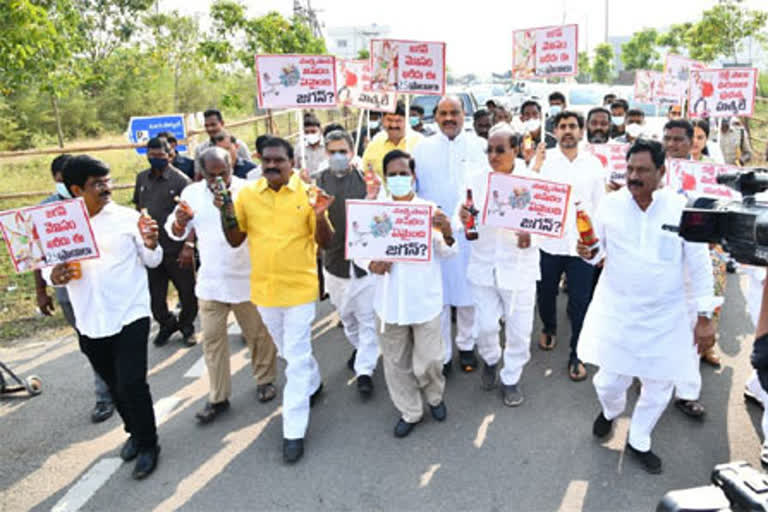 TDP fires on YSRCP over liquor deaths in west godavari