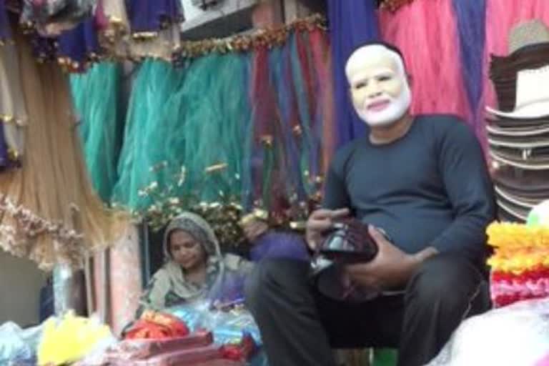 pm modi masks are in great demand for holi at in prayagraj market in up