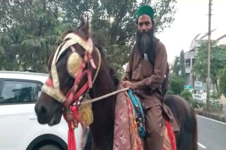 Man using Horses  due to increase in petrol price