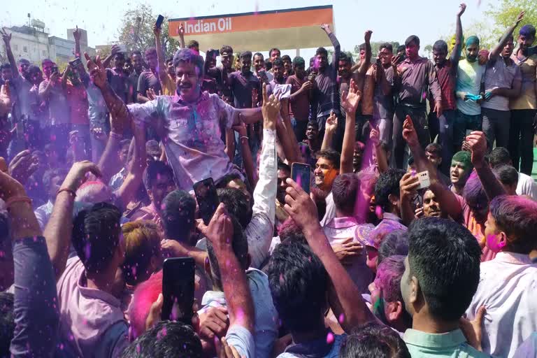 Policemen celebrate holi festival