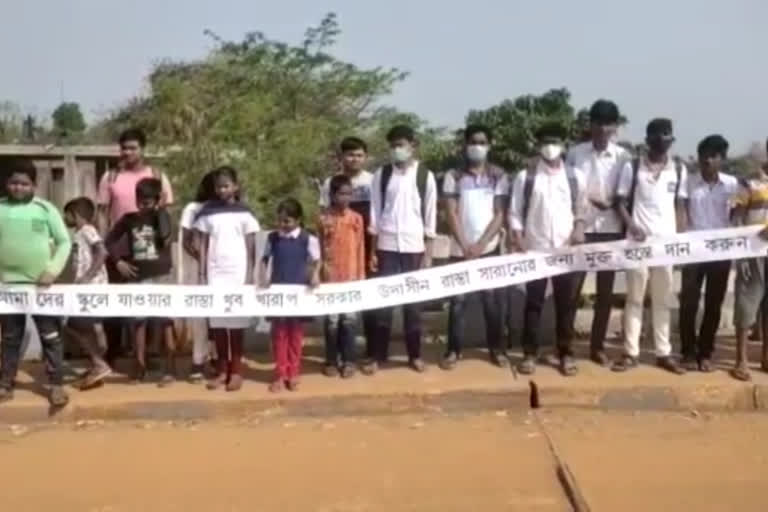 school students collecting money to repair local road at West Midnapore