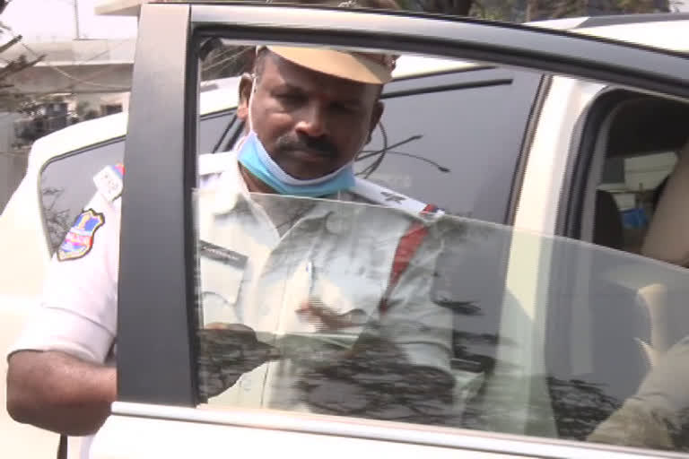 Police removing black film on car