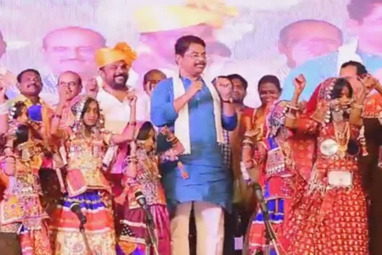 Minister Ashok and MLA Raju Gowda who dance to the lambani dance