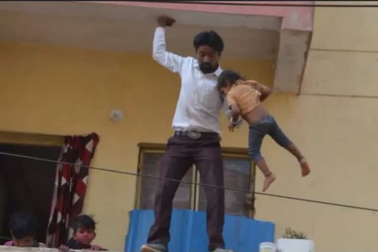 Illegal occupants climbed the roof with the child