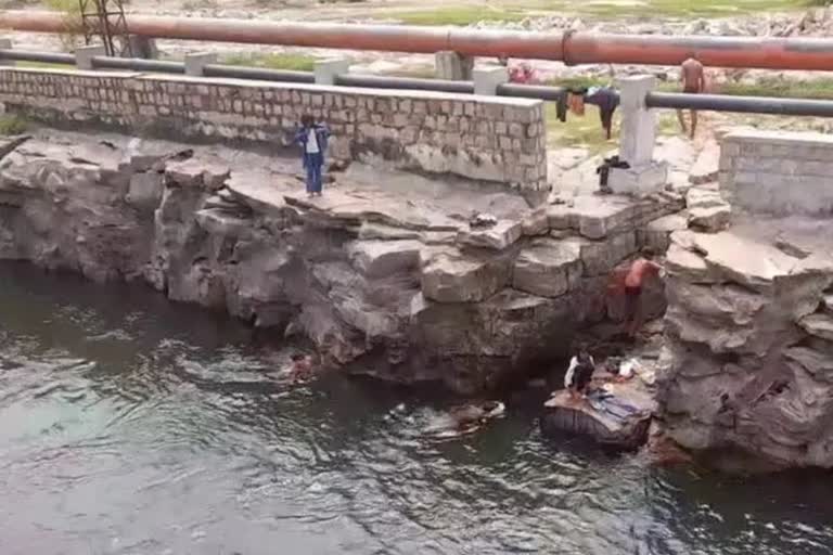 bathing in river and canal in Kota city