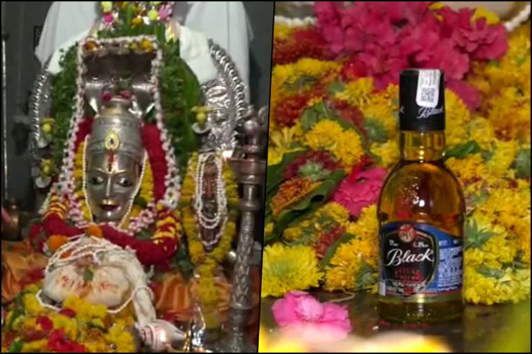 Devotees presents alcohol to god at Bagalkot
