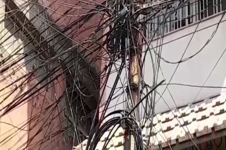 Electric and Cable lines in slum