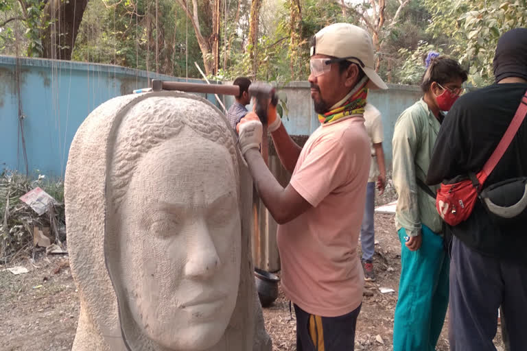 Sculptors carved sculptures in limestone