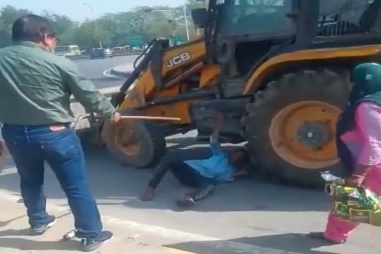 Greater Noida Authority bulldozer runs on handcart video goes viral