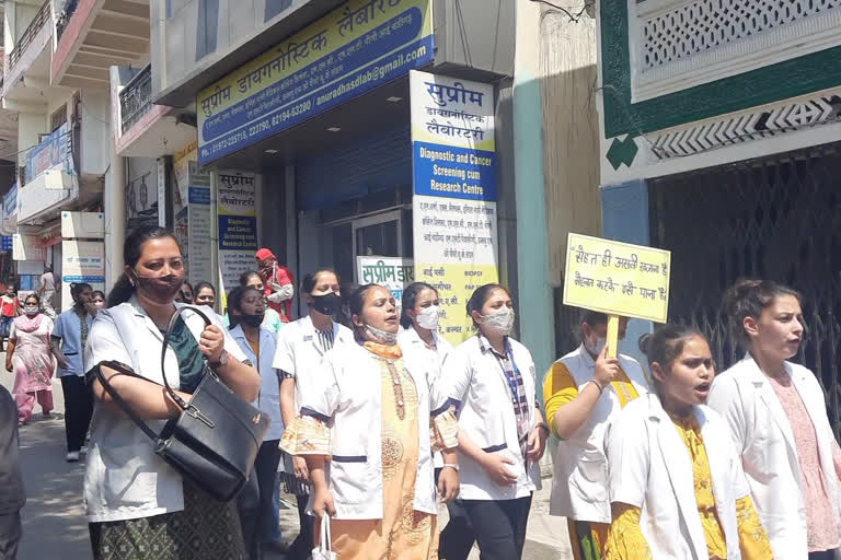 rally in Hamirpur market on International Health Day