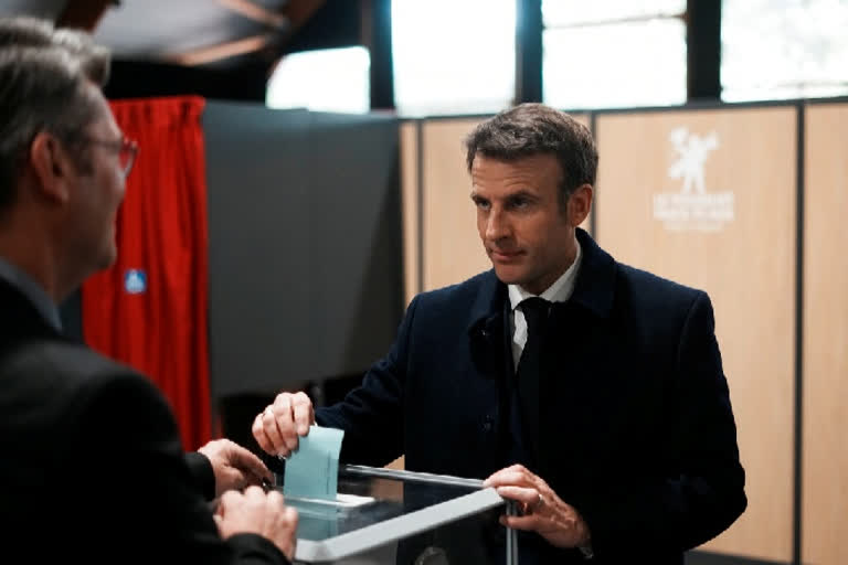 Macron, a centrist, is asking France's 48 million voters for a second five-year term — but there are 11 other candidates and widespread voter apathy standing in his way