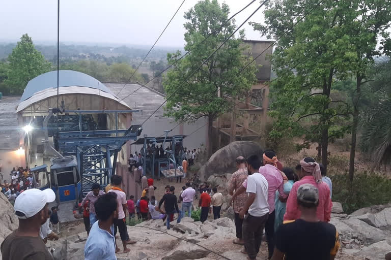 At least one person has died while 36 others lay trapped mid-air in a row of 12 ropeway trollies for more than 21 hours since the collision with each other at Trikut hills in Jharkhand's Deoghar district.