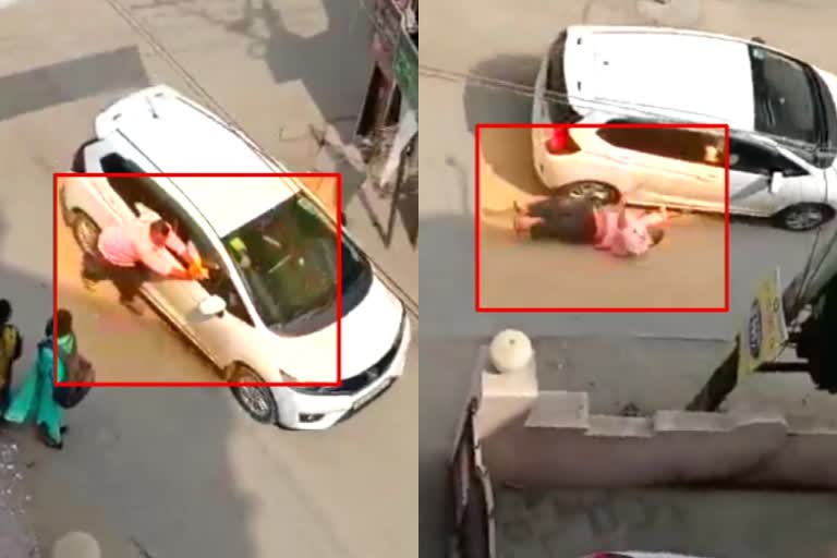 Car hit bike then dragged biker in patna  Road Accident In Bihar  Road Accident In Patna  Hit and run accident in Patna  Car driver hits man and drags him through the road in patna  patna Car driver hits man and drags him through the road  പട്‌ന കാർ ബൈക്ക് അപകടം  ബൈക്ക് യാത്രികനെ റോഡിലൂടെ വലിച്ചിഴച്ച് കാർ ഡ്രൈവർ  പട്‌ന നാഗേശ്വർ ബൈക്ക് യാത്രികനെ വലിച്ചിഴച്ച സംഭവം  patna Car driver drags Bike rider