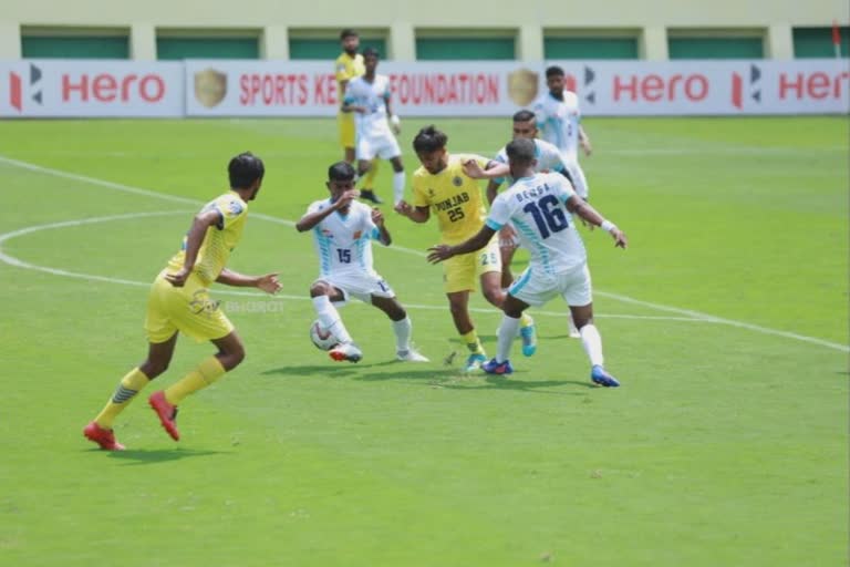 Santhosh Trophy  സന്തോഷ് ട്രോഫി:  santhosh-trophy-west-bengal-beat-punjab  ശുഭം ഭൗമിക് ആണ് ബംഗാളിനായി ഗോൾ നേടിയത്.  ആദ്യം ജയം വെസ്റ്റ് ബംഗാളിന്  സന്തോഷ് ട്രോഫി: ആദ്യം ജയം വെസ്റ്റ് ബംഗാളിന്, പഞ്ചാബിനെ എതിരില്ലാത്ത ഒരു ഗോളിന് പരാജയപ്പെടുത്തി  പഞ്ചാബിനെ എതിരില്ലാത്ത ഒരു ഗോളിന് പരാജയപ്പെടുത്തി  West Bengal Bengal beat defeated punjab  Shubham Bhowmick scored for Bengal.  west bengal vs punjab  santosh trophy results  santos trophy updates