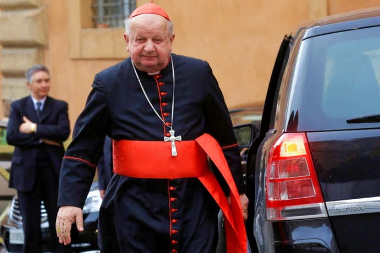 A Vatican investigation into allegations that the former top aide to St. John Paul II was negligent in handling sex abuse claims in his native Poland has cleared him of wrongdoing, the Vatican's embassy in Poland said Friday.