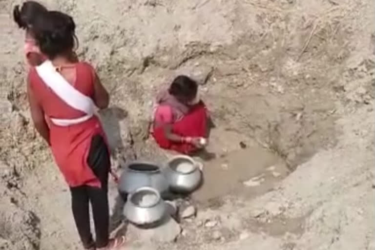 Searching water by digging pits