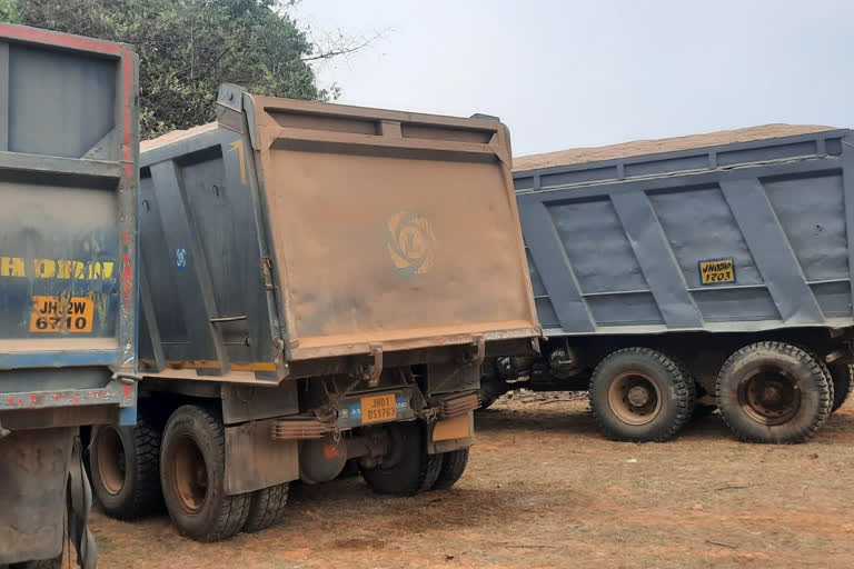 trucks seized in raid