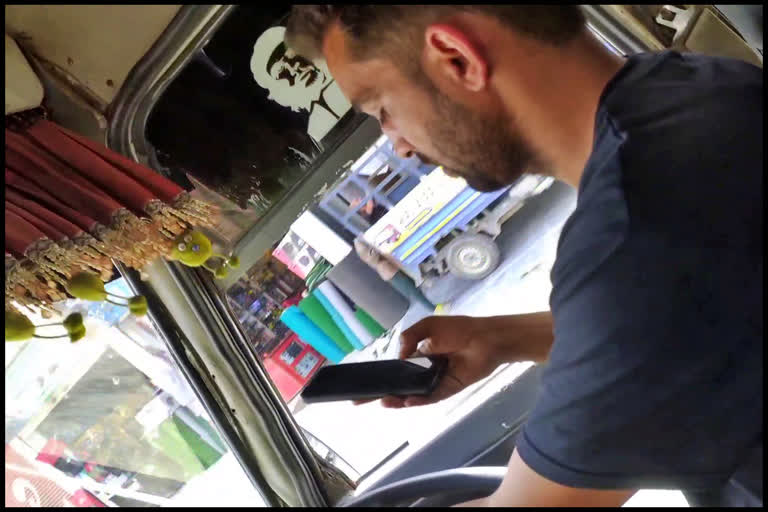 private bus driver use the phone while driving