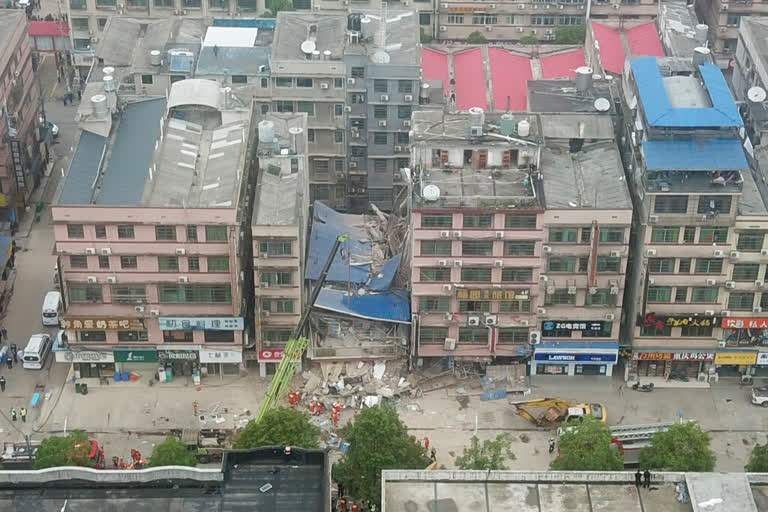 Woman rescued 50 hours after China building collapse