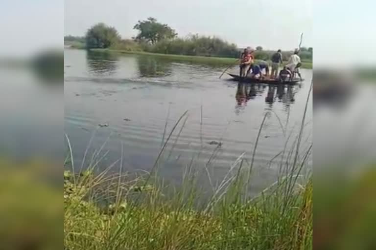 The son washed up in the river Kaveri in front of his father