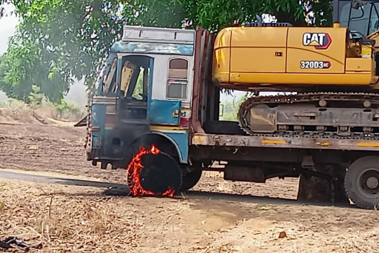 Fire in truck colliding with high tension line