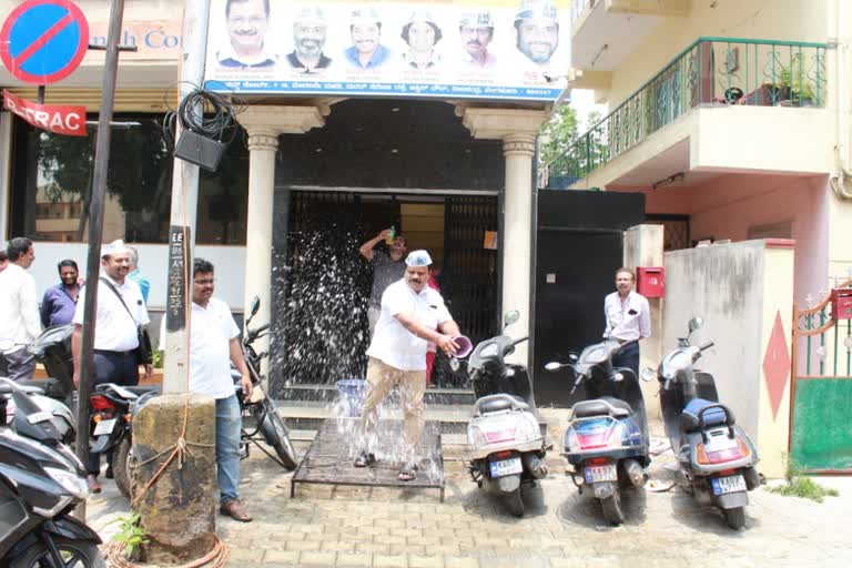 AAP LEADERS CLEANING WITH COW'S URINE