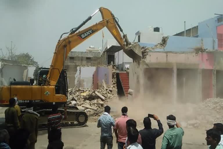 87 shops were demolished by bulldozers
