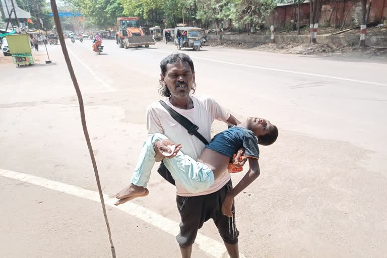 durg Father begging for disabled child