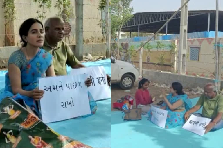 Gandhidham GST office protest  gst commissioner wife protest  allegations against gst commissioner by wife  ജിഎസ്‌ടി കമ്മിഷണർക്കെതിരെ പ്രതിഷേധം  ഗാന്ധിധാം ജിഎസ്‌ടി ഓഫിസ് കുത്തിയിരിപ്പ് സമരം