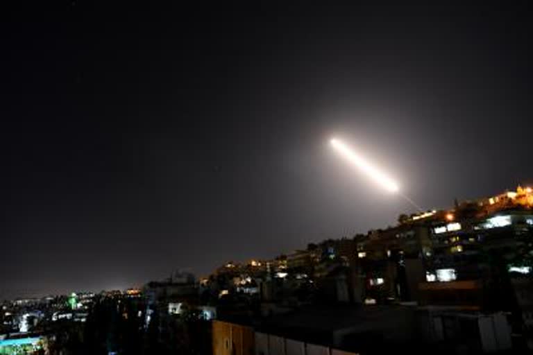 israeli missile strikes kill three near syrias capital