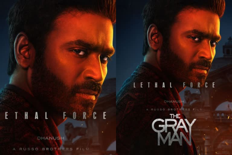 dhanush the gray man character poster  dhanush the gray man movie  the gray man movie character posters  dhanush the gray man movie release date  ധനുഷ് ദി ഗ്രേ മാന്‍ കാരക്‌ടര്‍ പോസ്‌റ്റര്‍  ധനുഷ് ദി ഗ്രേ മാന്‍ പോസ്‌റ്റര്‍  ധനുഷ് ദി ഗ്രേ മാന്‍ റിലീസ് ഡേറ്റ്