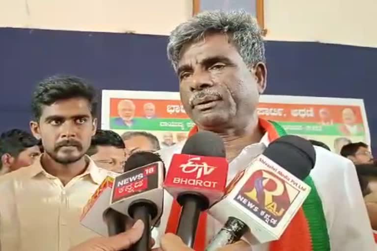 ministerKota Shrinivas Poojary