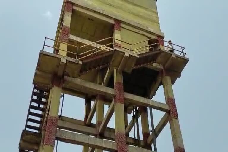 Engineer mounted on water tank