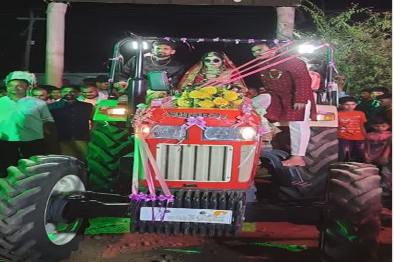 Bride drive tractor to reach mandap