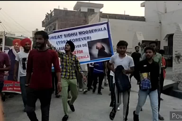candle march was taken out in Luxor for the peace of the soul of Punjabi singer Sidhu Moosewala.