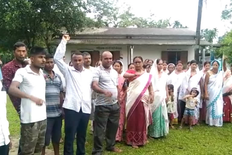 protest against headmaster in nowboicha