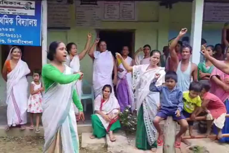 Protest against school merger at teok in Jorhat