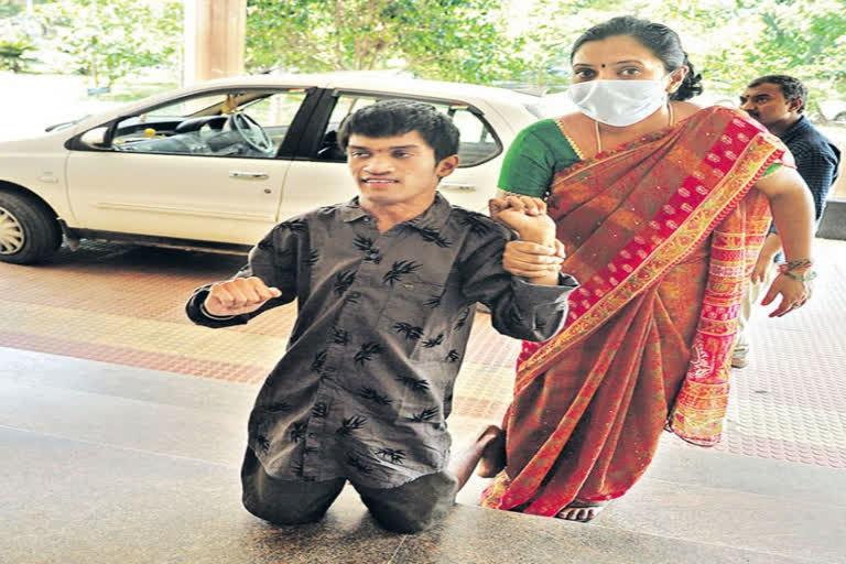 handicapped person faced problems in chittor collectorate as having no wheel chair