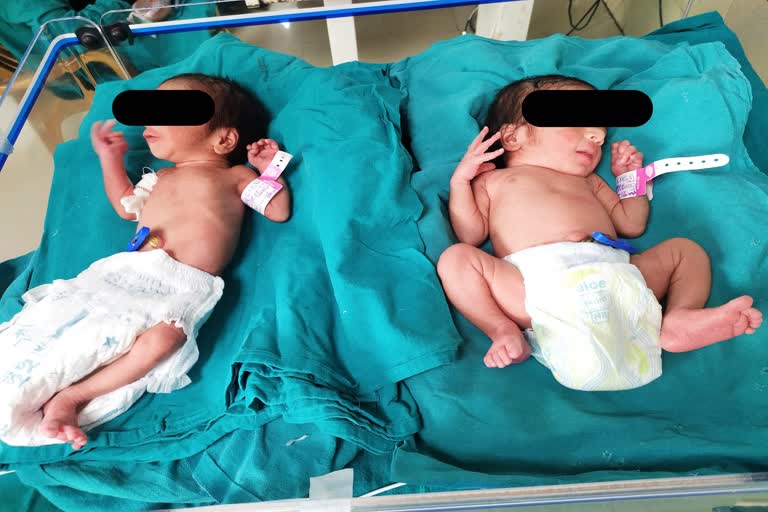 After giving twins birth in Surat, why did the woman leave the hospital so abruptly?