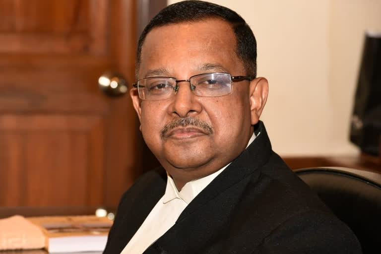 JUSTICE UJJAL BHUYAAN