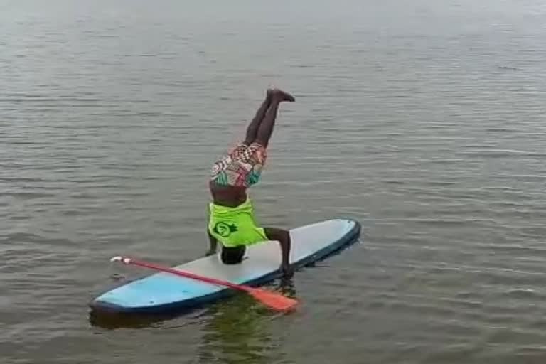 yoga show on river in Mangalore