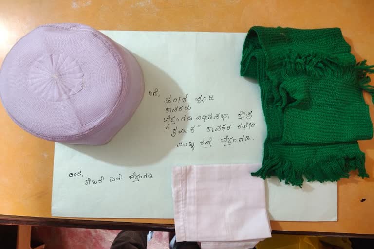 Muslim hat green shawl courier to MLA Harish Poonja