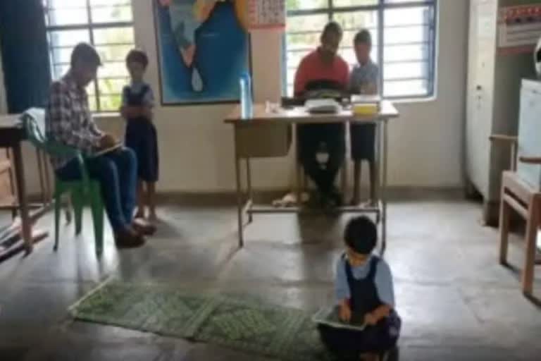 A School With Two Teachers And Four Students