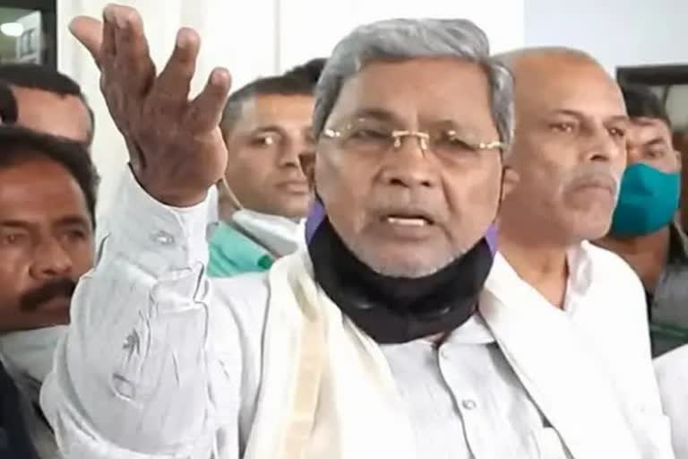 Opposition leader Siddaramaiah spark against minister R. Ashok