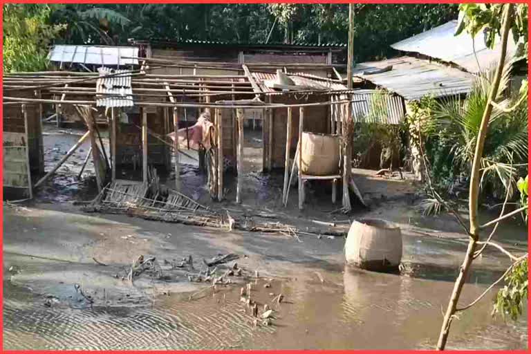 Flood victims crying for a drop of water and some foods in  flood camp at Rangia