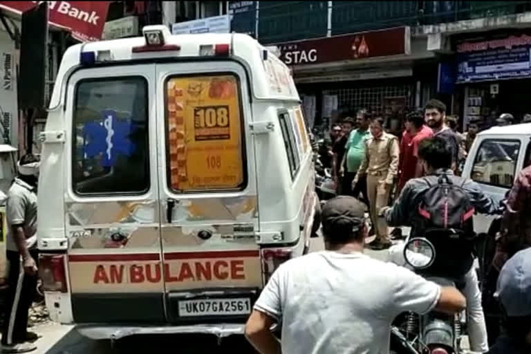 Ambulance with patient stuck in jam