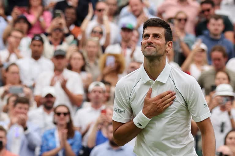 wimbledon  വിംബിള്‍ഡണ്‍  Wimbledon Novak Djokovic advances to 2nd round  Wimbledon Novak Djokovic advances to 2nd round with a unique record  ആദ്യ റൗണ്ട് കടന്ന് ജോക്കോവിച്ച്  വോൺ സൂൺ വൂവിന്‍റെ വെല്ലുവിളി അതിജീവിച്ചു