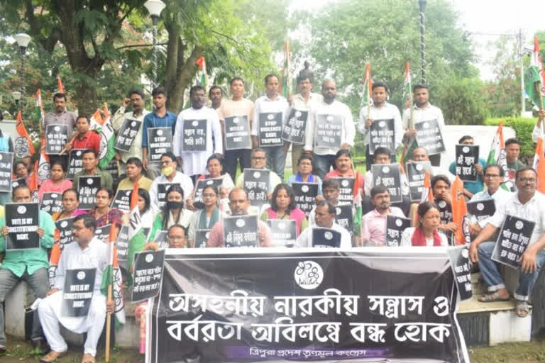 TMC holds silent protest against violence